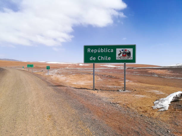 istock Chilean border road sign, Chile. Desert view 928525234