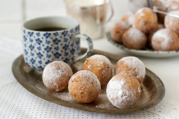 istock Vanilla krapfen doghnut with coffee. Rustic style. 928537380