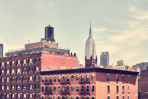 Retro toned picture of old Manhattan buildings, New York City, USA.