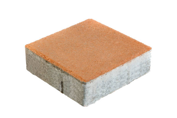 istock Single pavement brick, isolated. Concrete block for paving 928549618