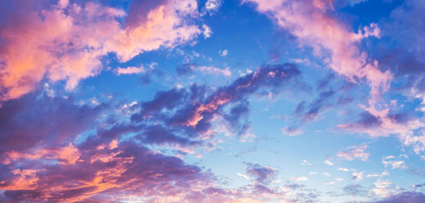 istock Panorama of beautiful evening cloudy sky. 928552714