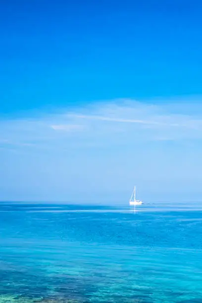 Sailing boat on the peaceful Adriatic Sea near the Croatian coast, Europe.