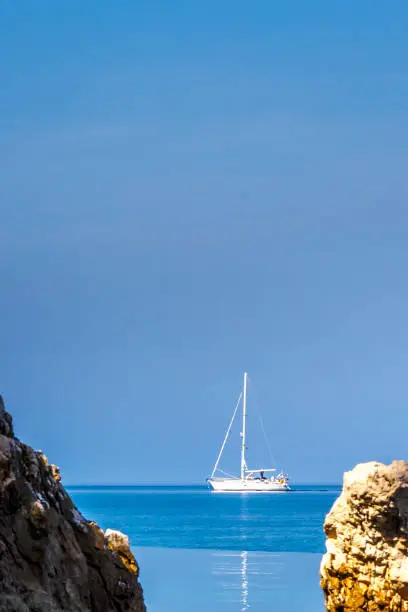 Sailing boat on the peaceful Adriatic Sea near the Croatian coast, Europe.