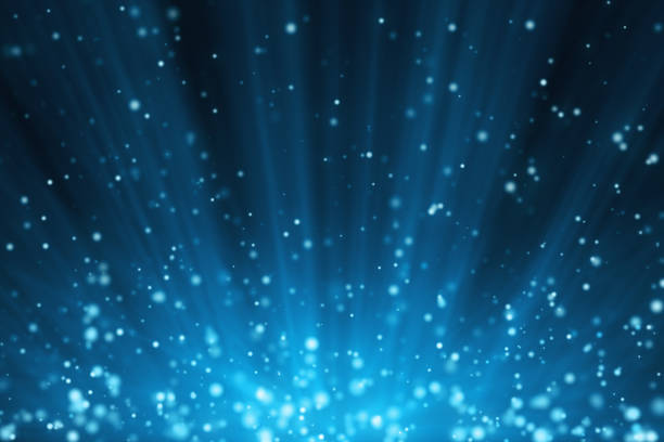 istock 3d illustration blue festive background with light rays and particles 928556974
