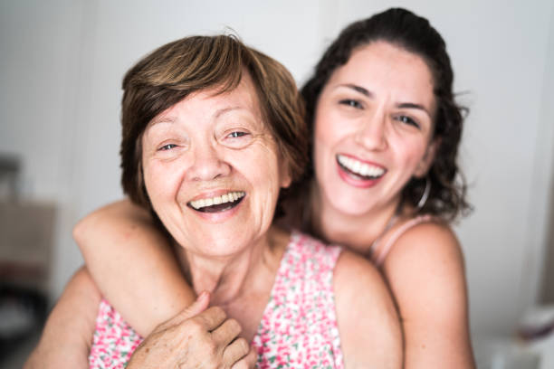 Happy adult mother and daughter embracing I Love You i love you photos stock pictures, royalty-free photos & images