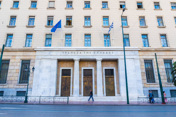 facade of the central building of national bank of greece in athens - eurozone debt crisis imagens e fotografias de stock