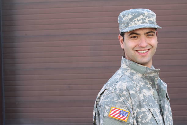 istock Soldier smiling close up isolated with copyspace 928569998