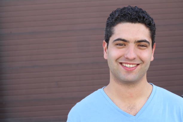 istock Striking man smiling close-up with copy space 928570100
