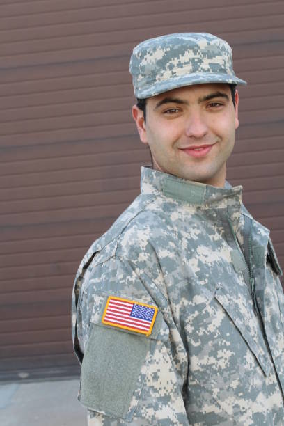 istock Soldier smiling close up isolated 928570800