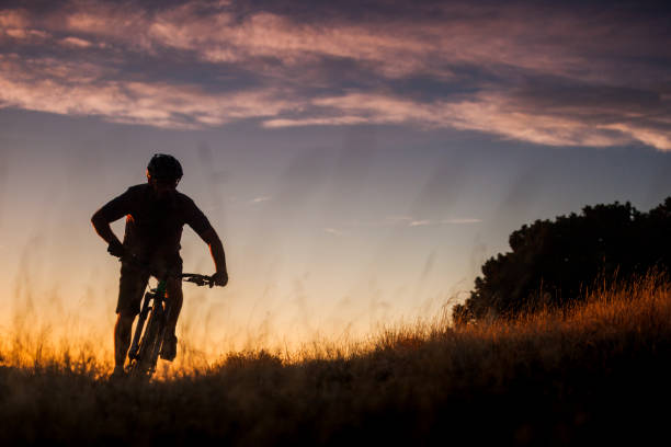 istock nature inspiration man mountain biking 928573970