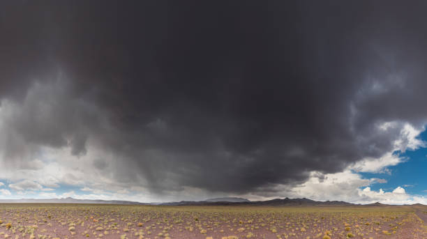 istock Atacama desert, dark cloud, thunderstorm and rain 928576334