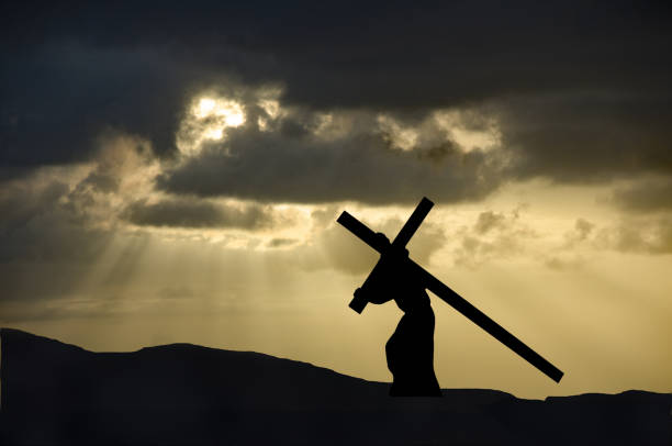 istock Jesus Christ carrying the cross on Good Friday 928583032