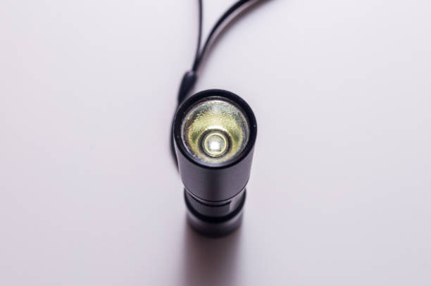 led aluminium flashlight. black torch. - forensic science flash imagens e fotografias de stock