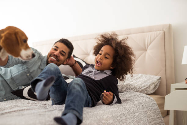 istock Bedtime for puppy and kids! 928591860