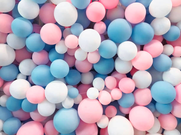 Many colorful balloons decorated wall as background