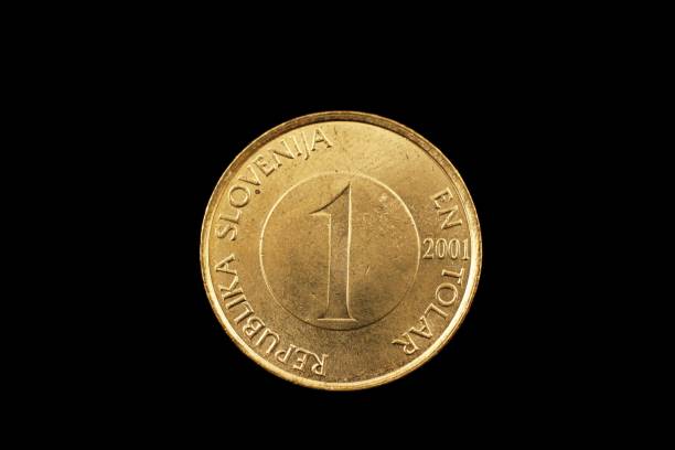 istock Slovenian One Tolar Coin Isolated On Black 928594392