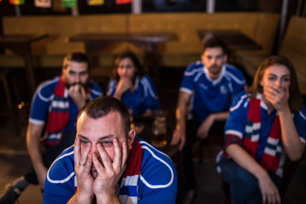 istock Friends Watching A Sportsgame 928608130