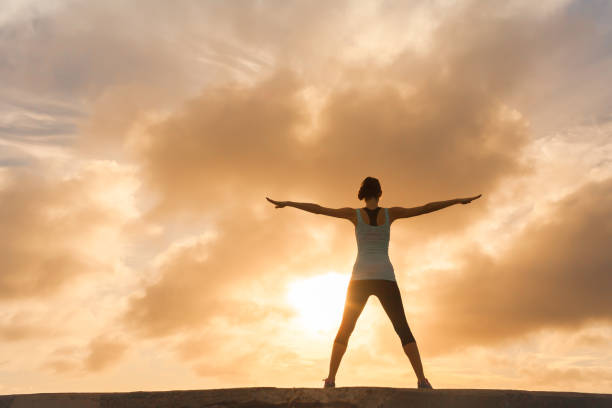 istock Woman stretching outdoors 928613154