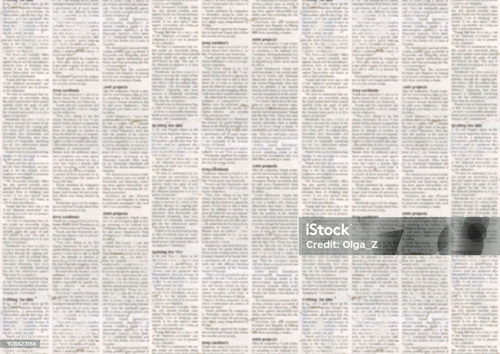 Old newspaper texture background Old newspaper paper texture background. Blurred vintage newspaper background. Aged paper textured page. Gray collage news paper background. Newspaper Stock Photo