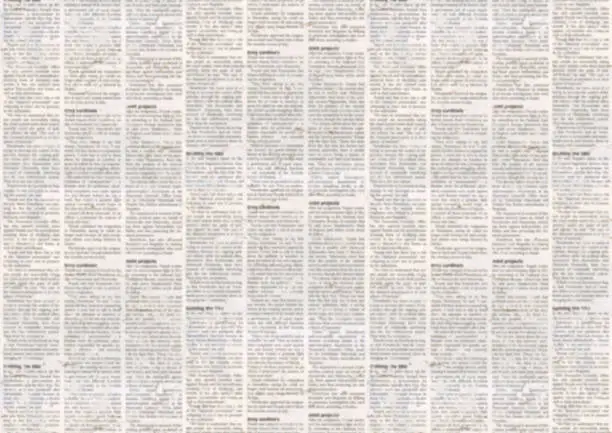 Old newspaper paper texture background. Blurred vintage newspaper background. Aged paper textured page. Gray collage news paper background.