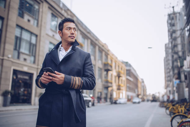 istock Man with phone outdoors 928627124