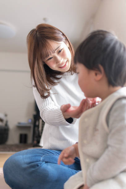 istock Beautiful mother taking care of son 928647800