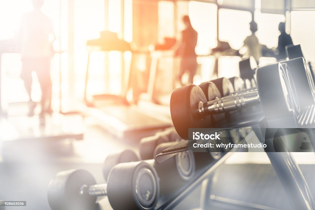 Rows of dumbbells in the gym with hign contrast and monochrome color tone Gym Stock Photo