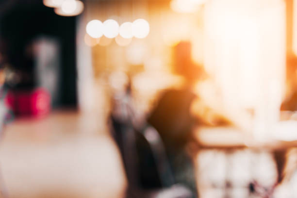 istock blur image background of office or co working space with people 928653106
