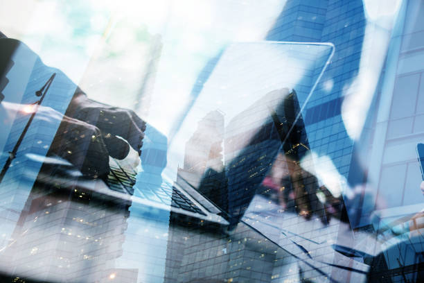 istock business man working with laptop business ideas concept with daylight from window double exposure with cityscape building and filter effect 928653150