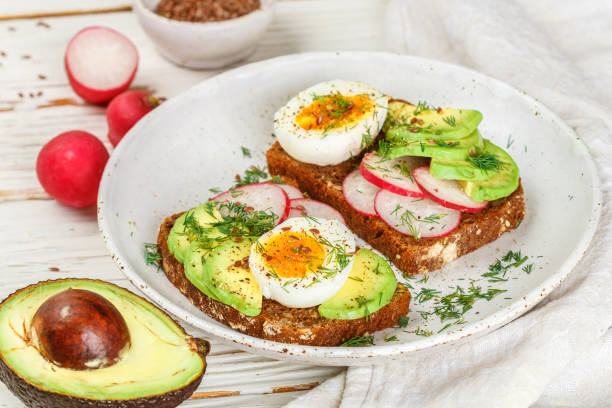 istock Toast with avocado, radish, egg and flax seeds 928653426