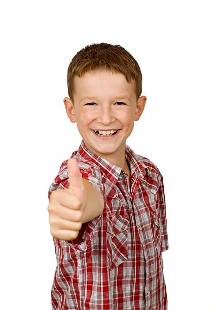 istock School boy showing thumbs up 92868117