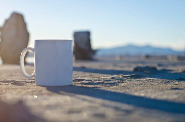 istock Side view of a blank white coffee mug at sunset 928685634