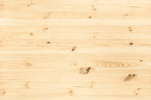Natural wood texture background. Natural light colored wood texture background viewed from above. Use this clean wooden textured material as graphic design asset for a wall, floor boards, wallpaper, table surface or other furniture. pine wood material stock pictures, royalty-free photos & images