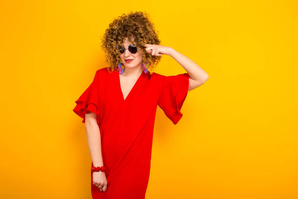 istock Attractive woman with short curly hair 928698414