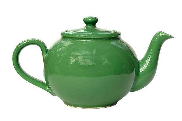 istock Close-up of green teapot isolated on white background 92869904
