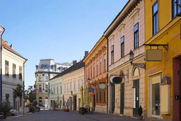 Picturesque streets of hungarian city Pecs in sunny autumn day