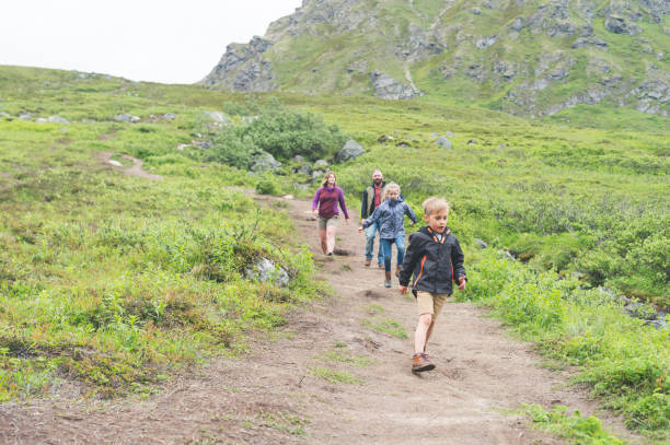 istock Family hiking on Alaska mountain 928702624