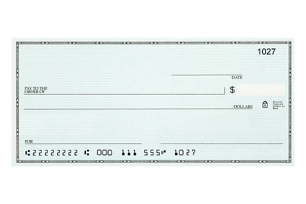 close-up of blank bank check sample against white background - bank stockfoto's en -beelden