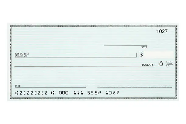 Photo of Close-up of blank bank check sample against white background