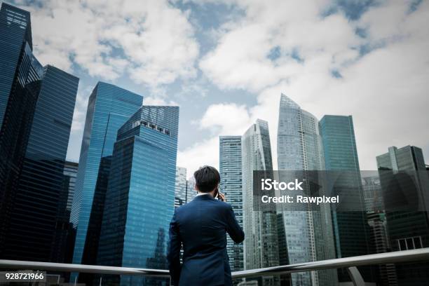 Asian Businessman In A City Stock Photo - Download Image Now - Business, Singapore, Businessman