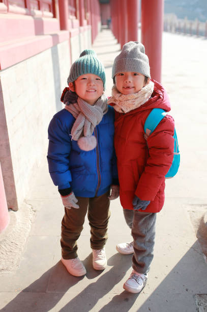 Cute Children in the Imperial Palace Cute Children in the Imperial Palace forbidden city beijing architecture chinese ethnicity stock pictures, royalty-free photos & images