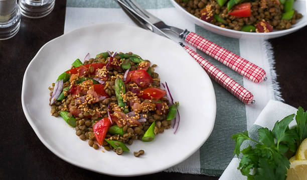 istock Close up on a lentils salad with veggies 928725870