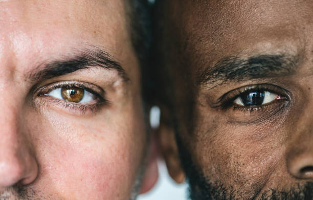 Two different ethnic men's eyes closeup Two different ethnic men's eyes closeup version 2 stock pictures, royalty-free photos & images