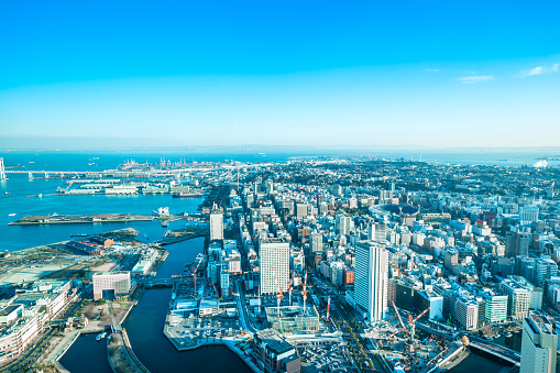panoramic modern city skyline aerial view under blue sky in Yokohama, Japan