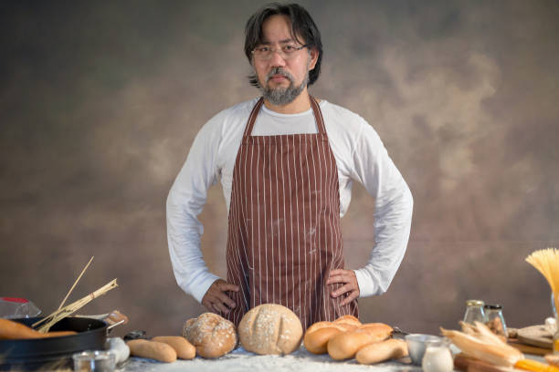 istock Man Chef hipster stylish with baguette on the beautiful background 928744016