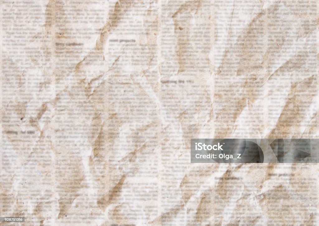 Old crumpled newspaper texture background Old crumpled grunge newspaper paper texture background. Blurred vintage newspaper background. Crumpled paper textured page. Sepia color collage news paper background. Newspaper Stock Photo