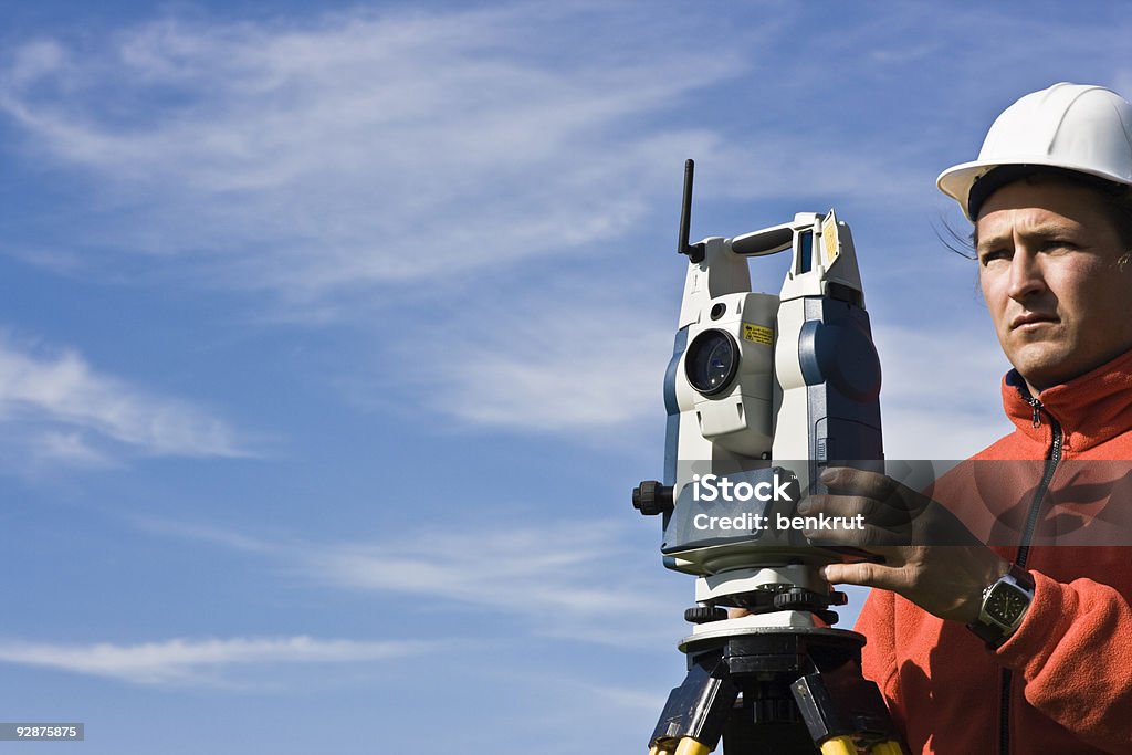 Measuring with theodolite  Cartographer Stock Photo