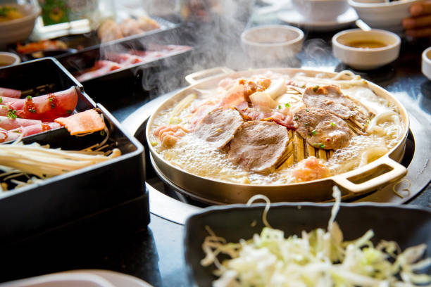 istock pork slice grilled on yakiniku hot pan. 928762372