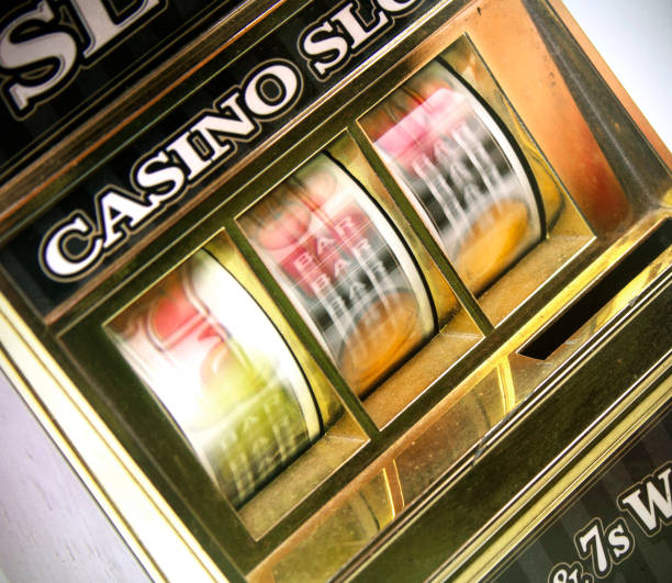 istock retro toy slot machine spinning 928765236