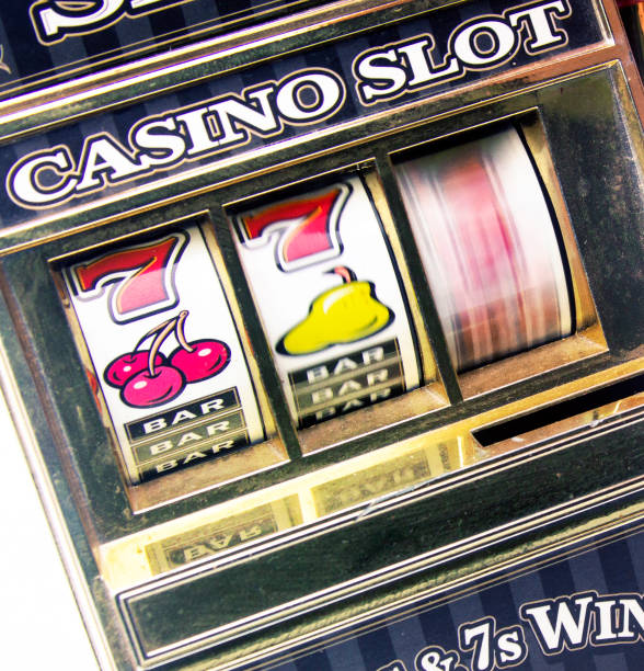 istock retro toy slot machine spinning 928765242